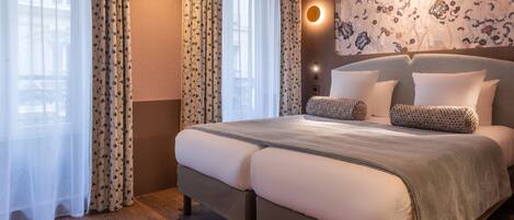 Premium bedding, in-room safe, laptop workspace, blackout curtains