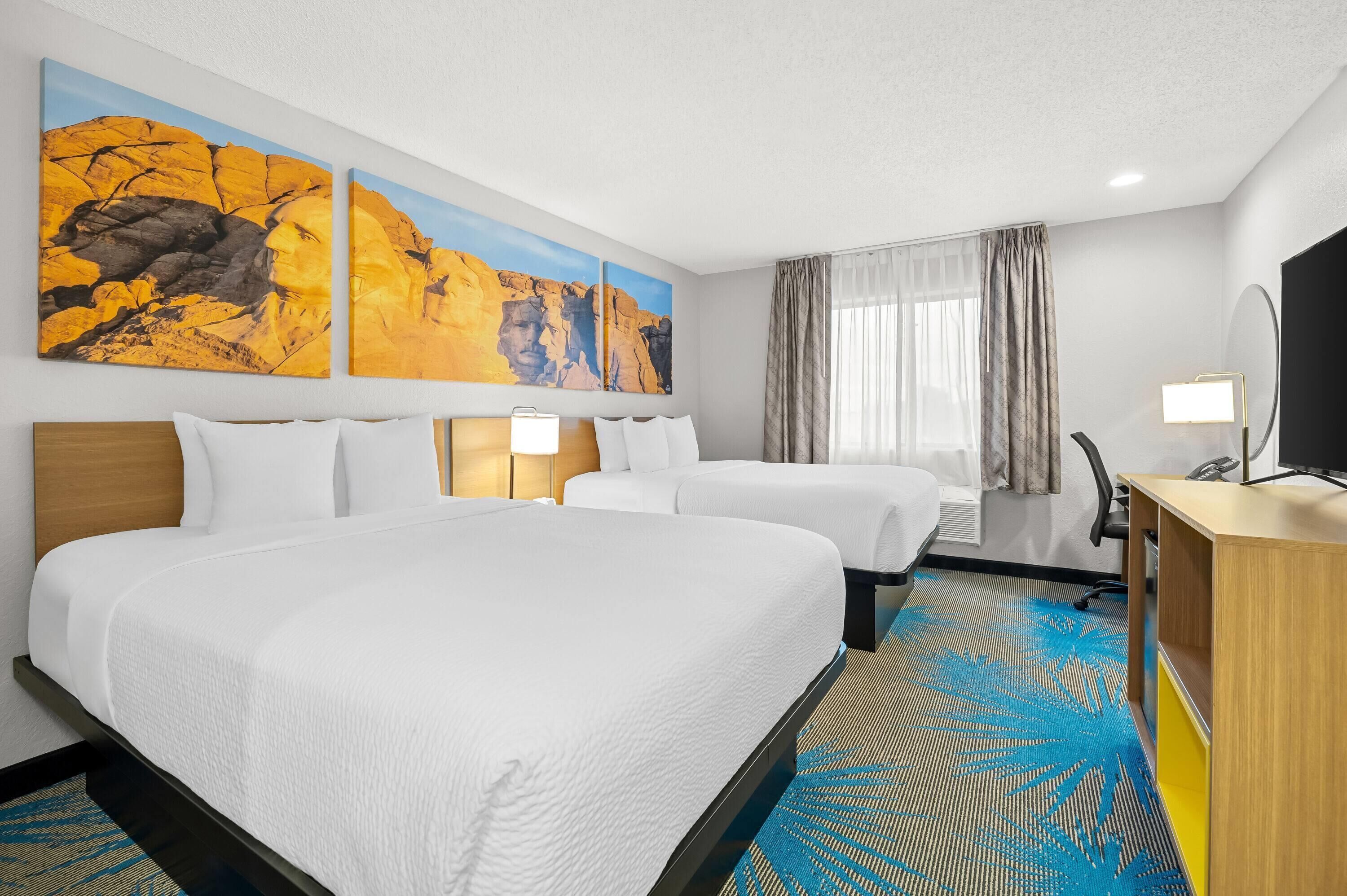 Habitación estándar, 2 camas Queen size | Camas con pillow-top, escritorio, cortinas blackout y wifi gratis 