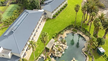 2 outdoor pools, open 7 AM to 10 PM, pool umbrellas, pool loungers