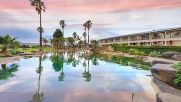 2 outdoor pools, open 7 AM to 10 PM, pool umbrellas, sun loungers