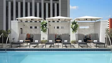 Seasonal outdoor pool, open 7:00 AM to 11:00 PM, free cabanas