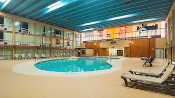 Indoor pool, open 9:00 AM to 9:00 PM, pool loungers
