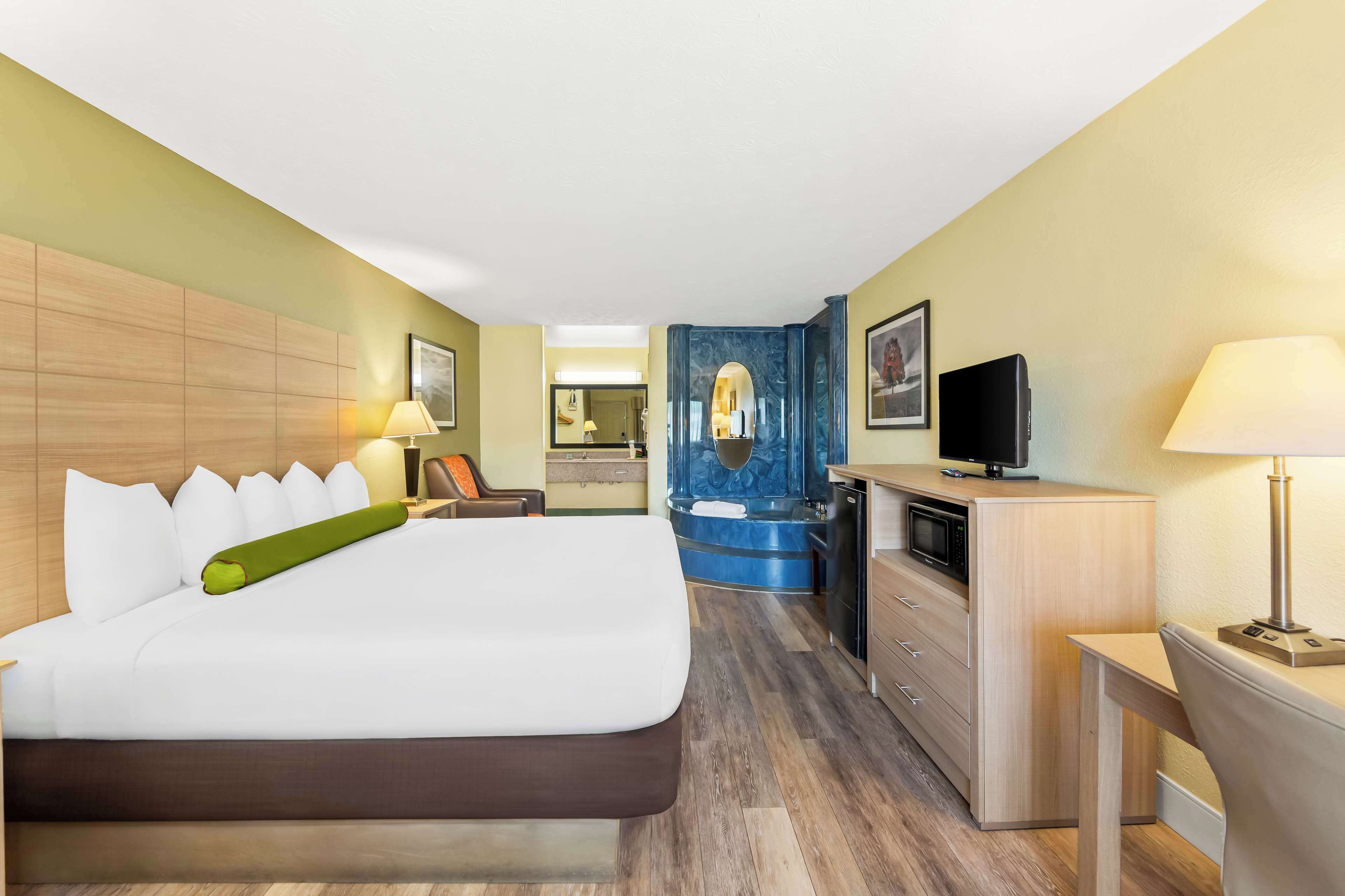 Pillowtop beds, desk, laptop workspace, iron/ironing board