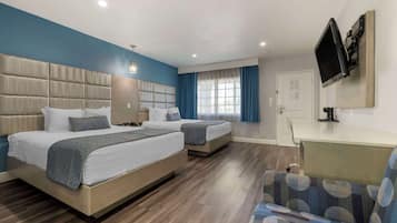 Pillow-top beds, desk, laptop workspace, blackout curtains