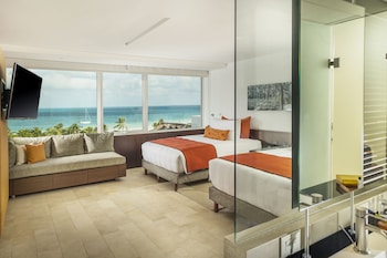 Club Suite, 2 Queen Beds, Ocean View | Premium bedding, down comforters, Tempur-Pedic beds, minibar at InterContinental Presidente Cancun Resort, an IHG Hotel