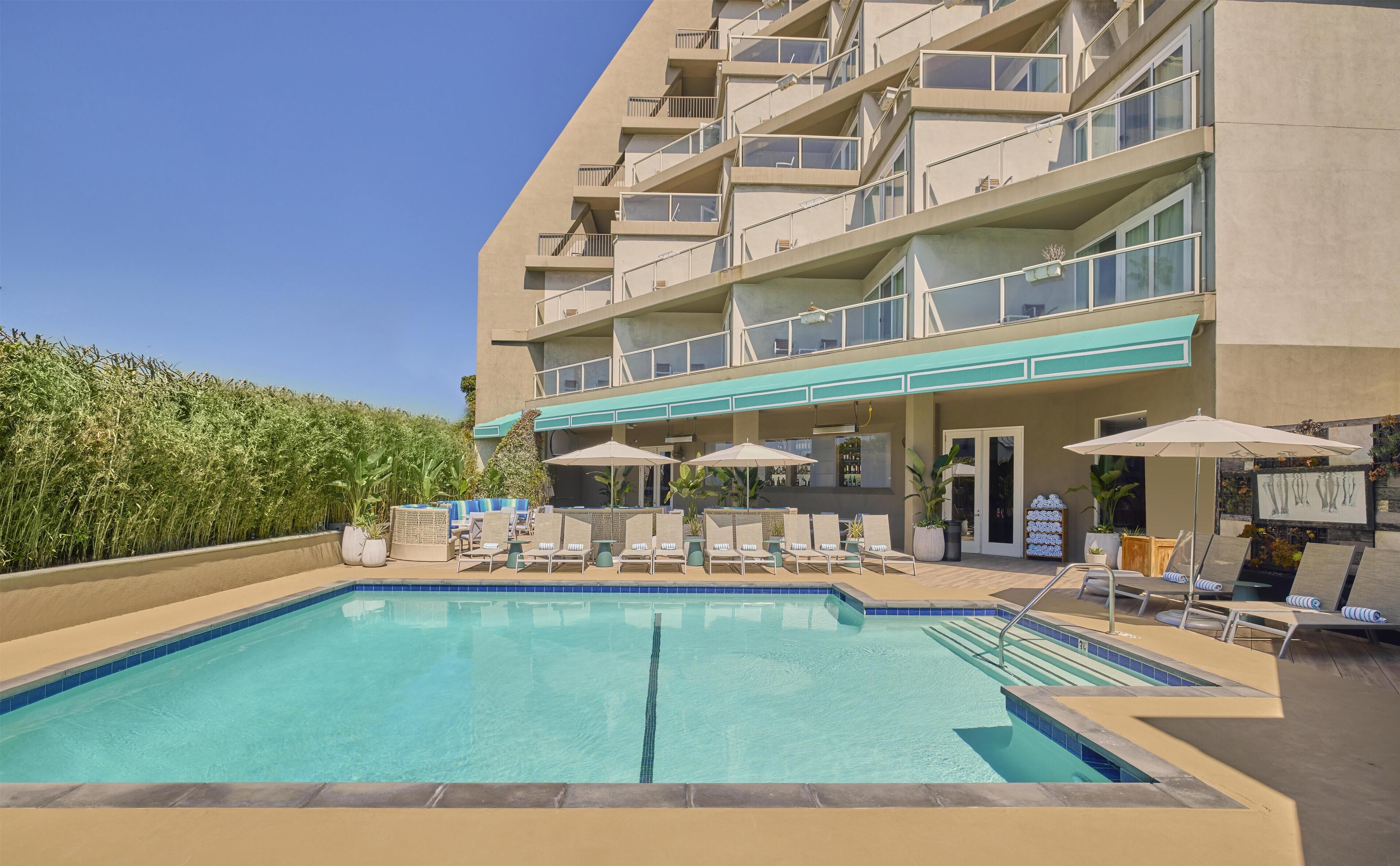 Outdoor pool, open 8:00 AM to 10:00 PM, cabanas (surcharge)