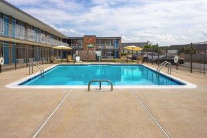Seasonal outdoor pool, open 9:00 AM to 6:00 PM, sun loungers