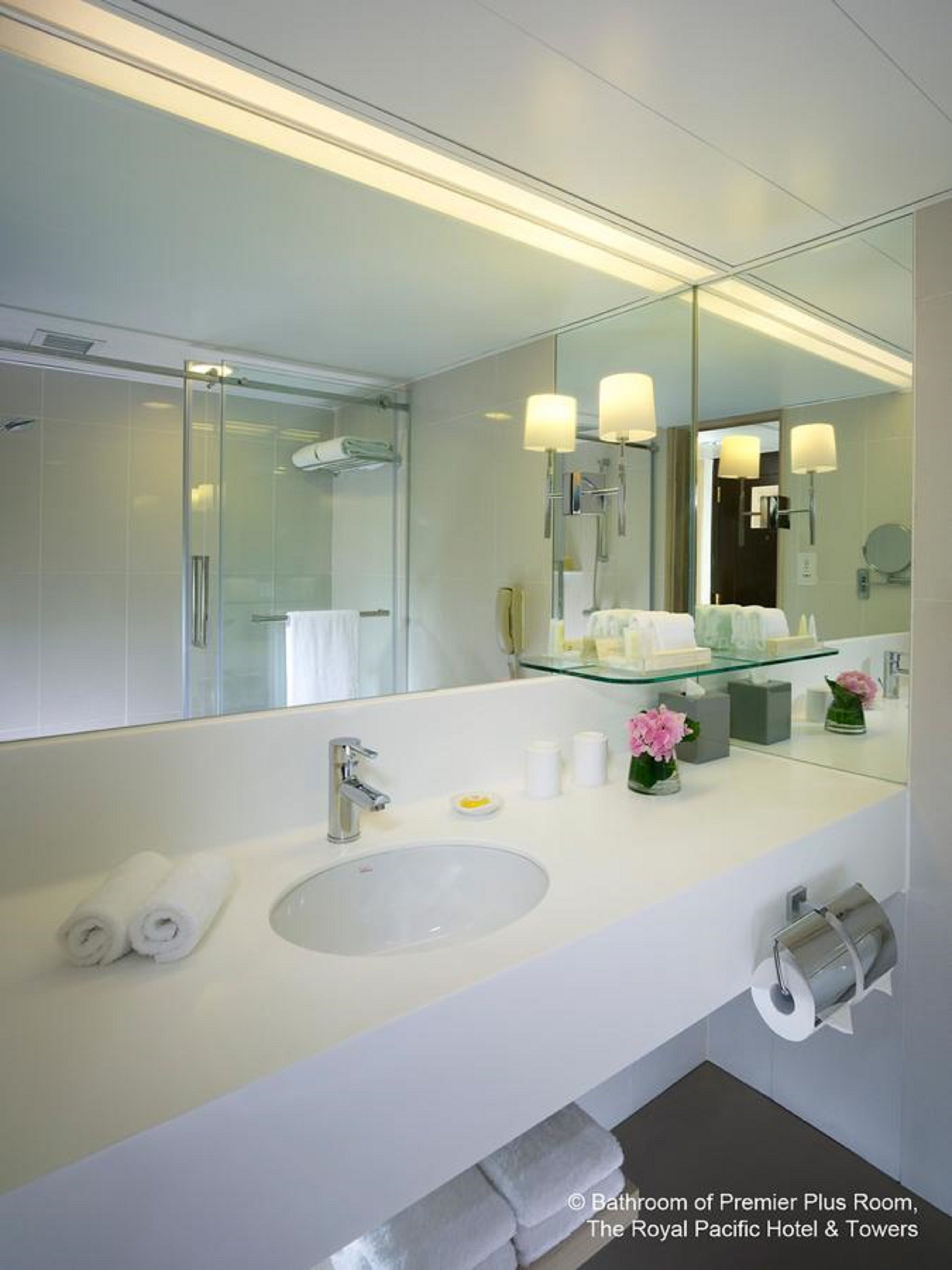 premier room | bathroom | hair dryer, slippers, towels