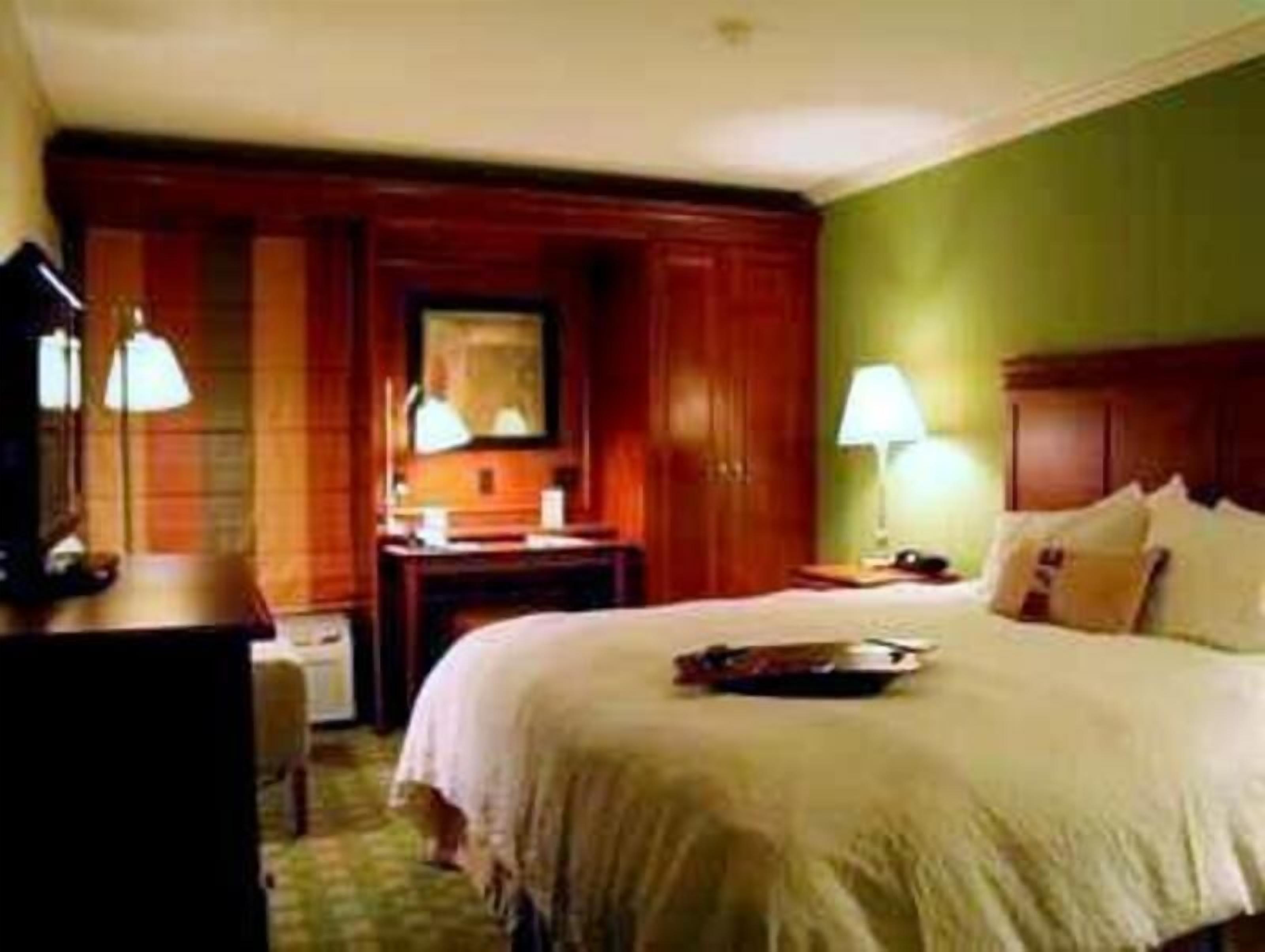 Desk, blackout drapes, iron/ironing board, free cribs/infant beds