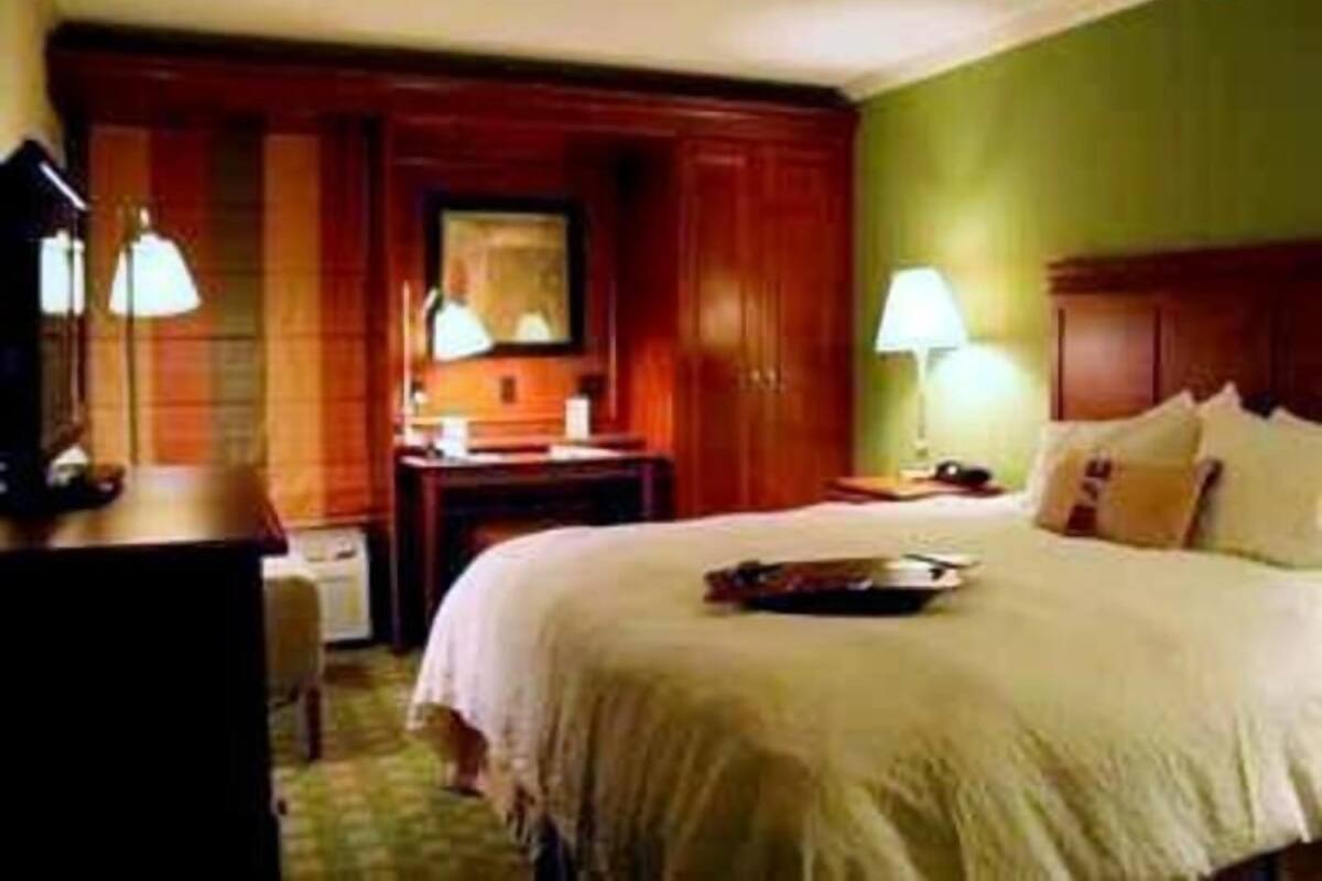 Desk, blackout drapes, iron/ironing board, free cribs/infant beds