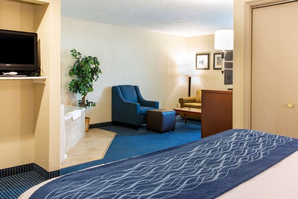 Down comforters, desk, blackout drapes, iron/ironing board