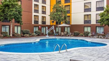 Seasonal outdoor pool, open 10 AM to 10:00 PM, pool umbrellas