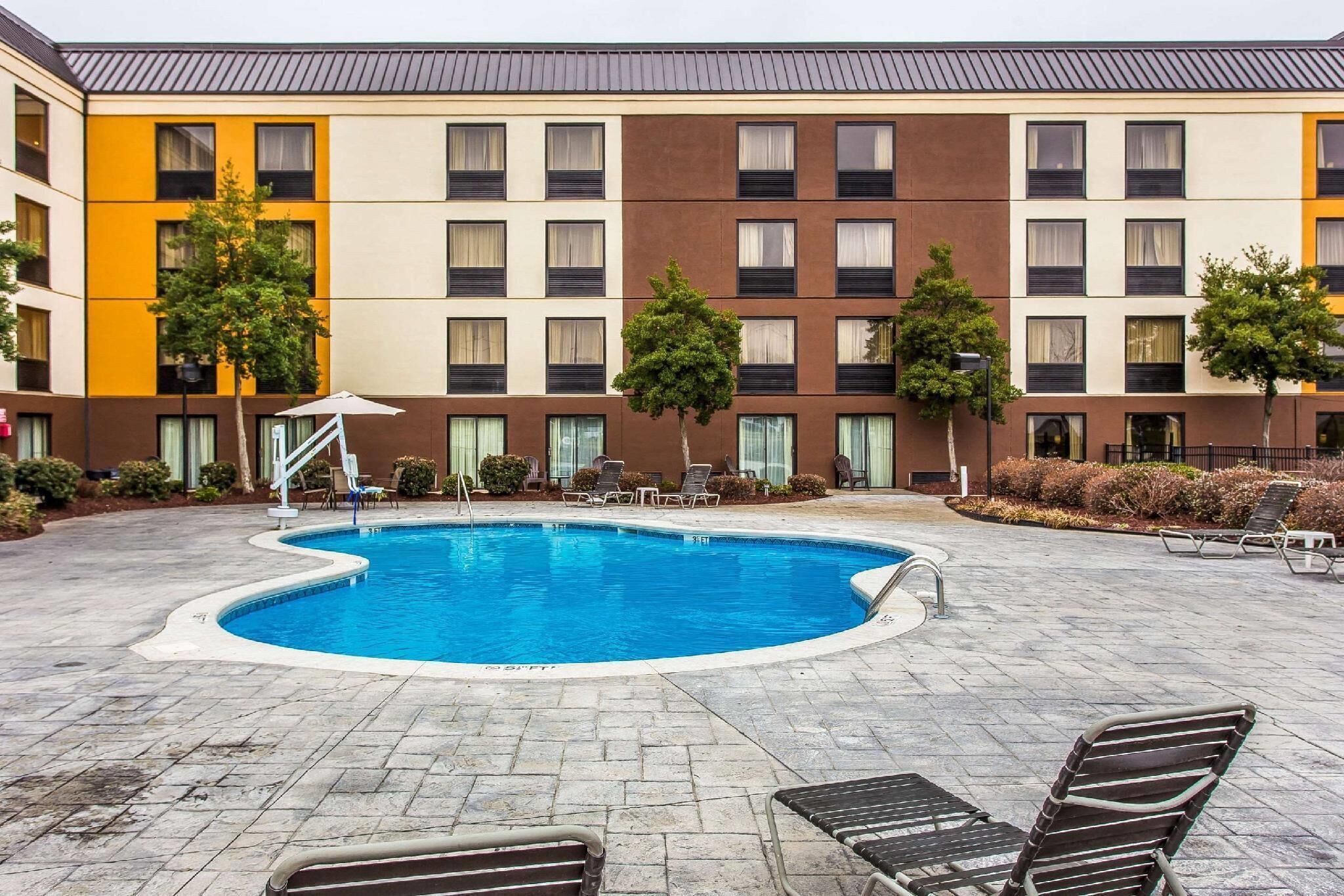 Seasonal outdoor pool, open 10 AM to 10:00 PM, pool umbrellas