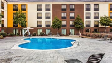 Seasonal outdoor pool, open 10 AM to 10:00 PM, pool umbrellas