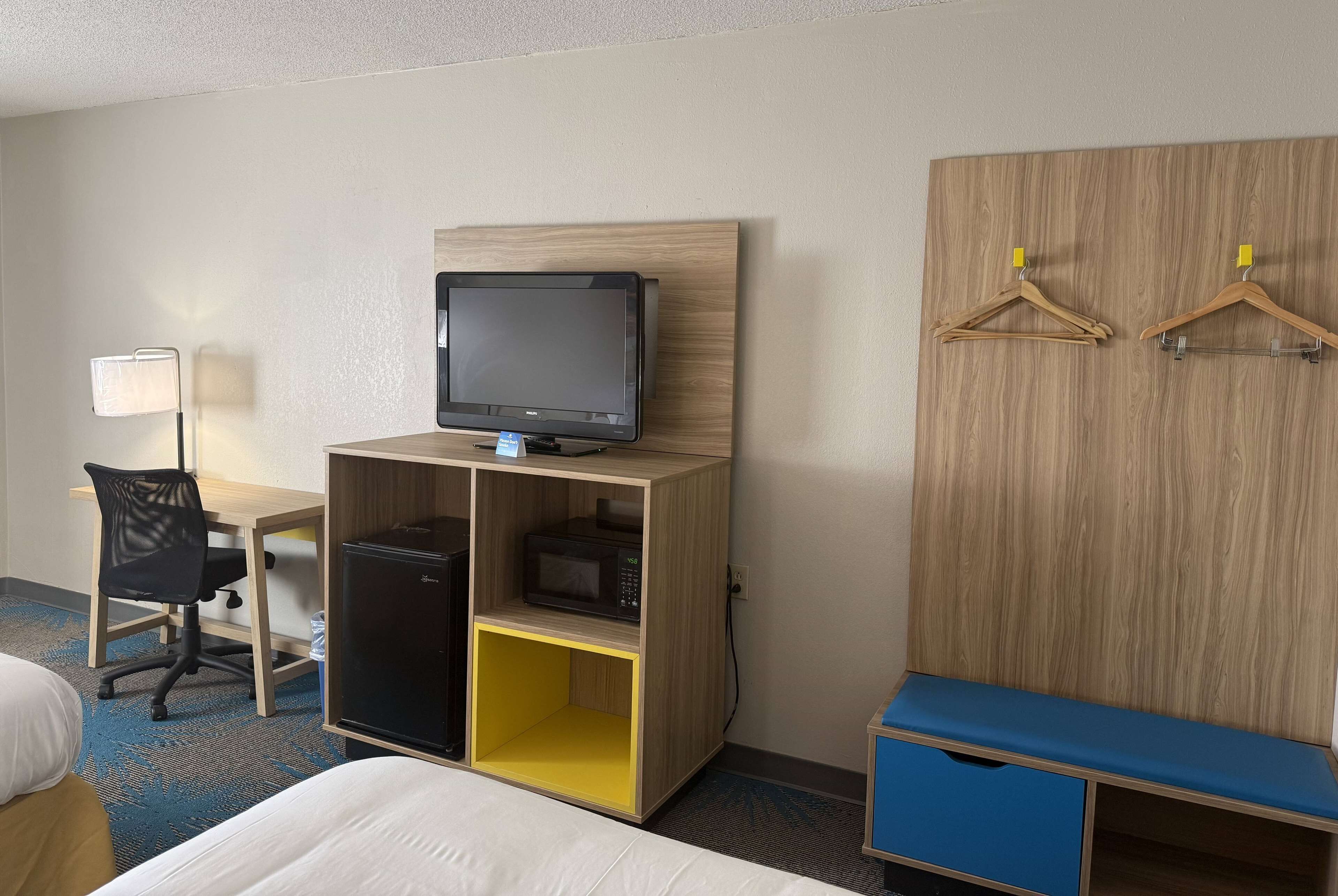 Desk, laptop workspace, free WiFi, bed sheets