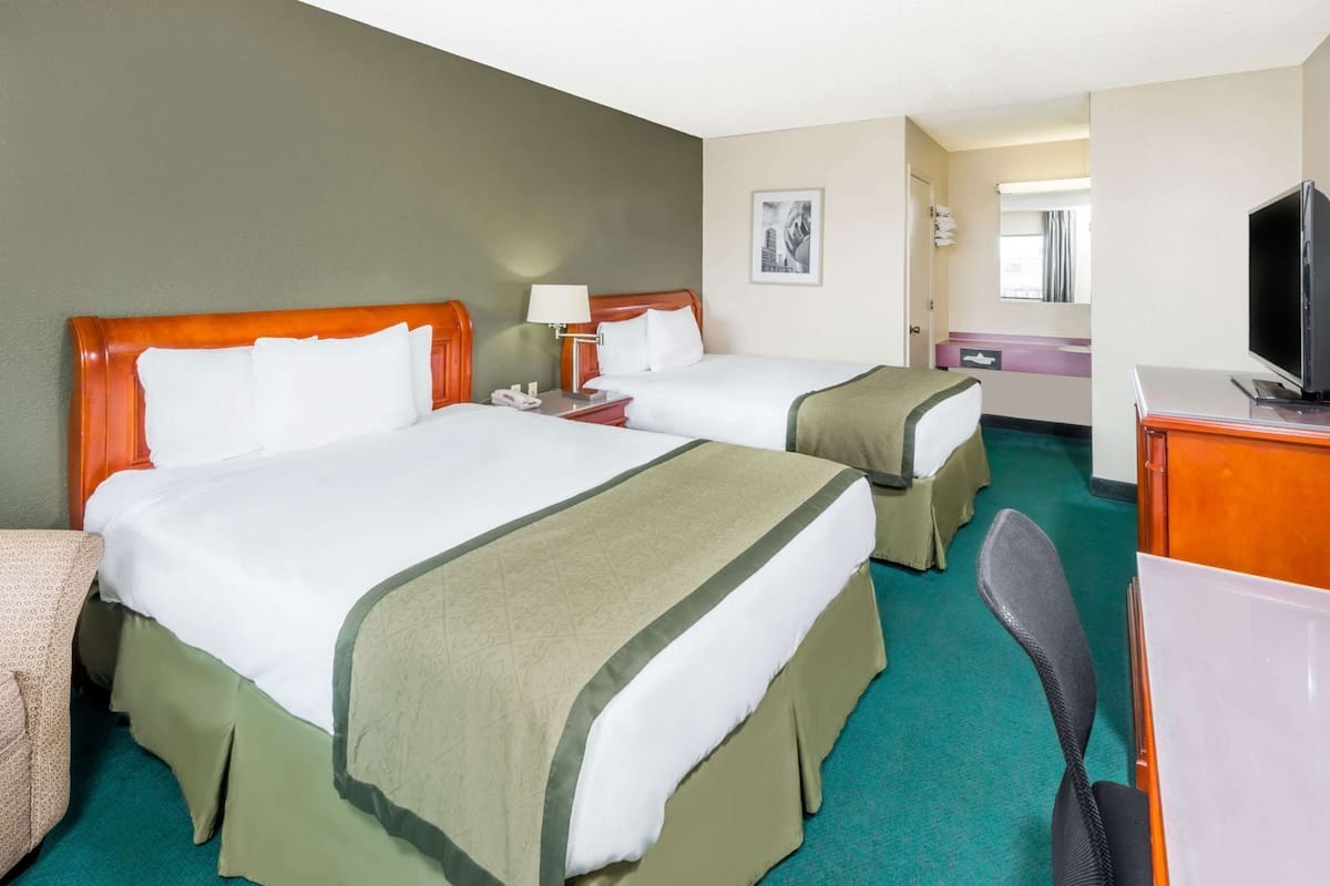 Desk, laptop workspace, free WiFi, bed sheets