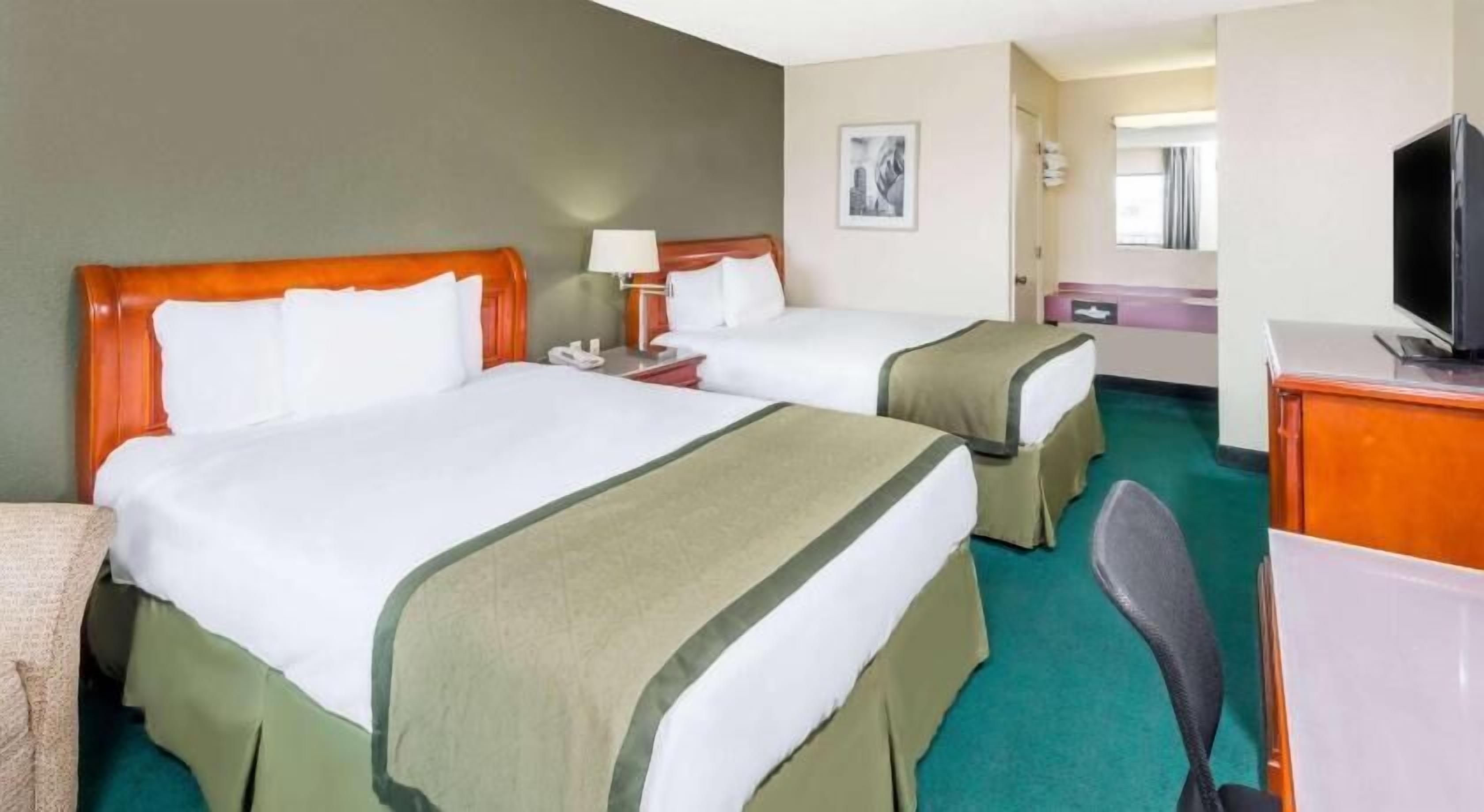 Desk, laptop workspace, free WiFi, bed sheets