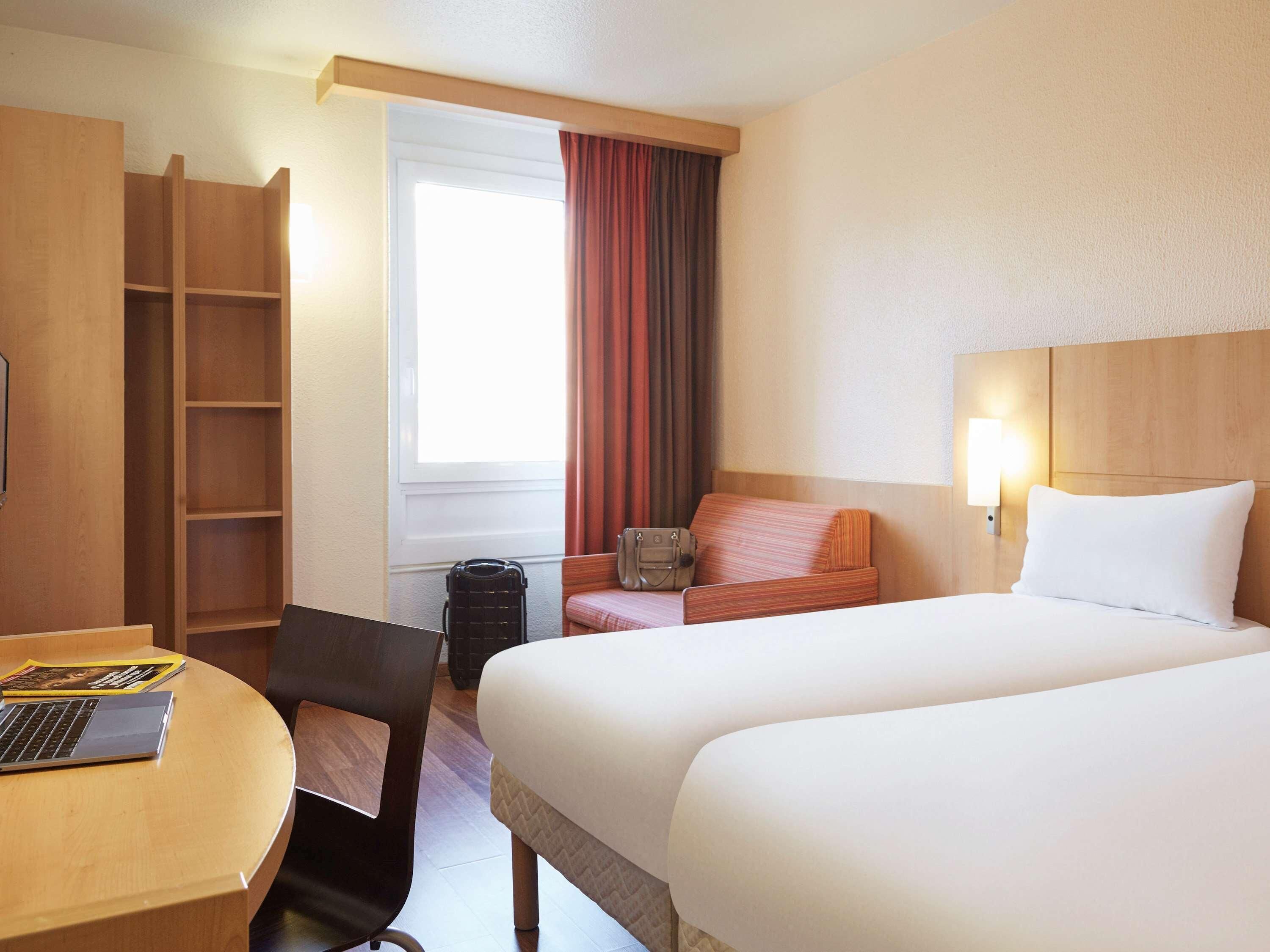 Premium bedding, desk, blackout curtains, soundproofing