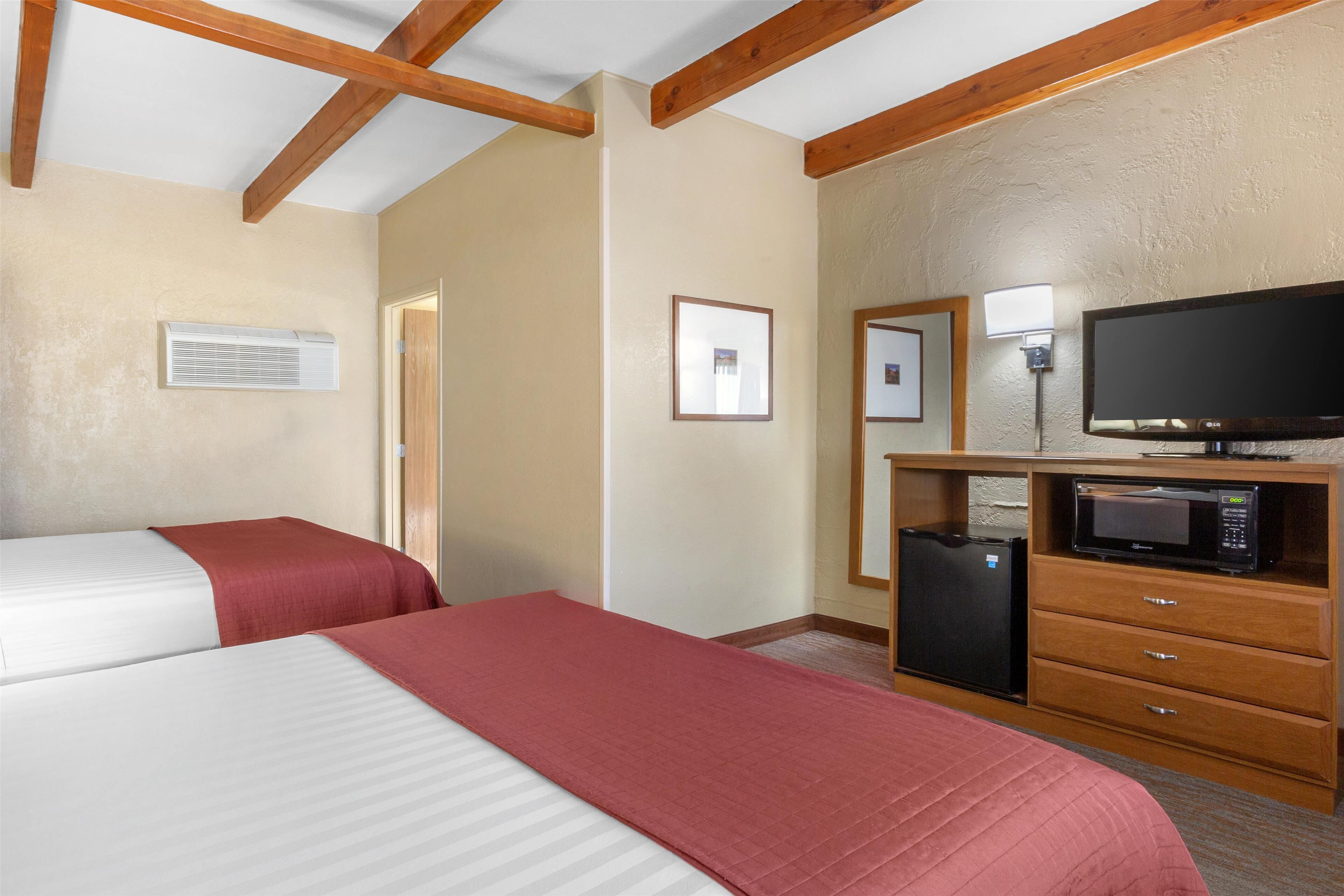 standard room, 2 queen beds, non smoking | individually furnished, desk, laptop workspace, blackout curtains