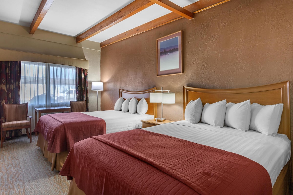 Standard Room, 2 Queen Beds, Non Smoking | Desk, laptop workspace, blackout drapes, soundproofing