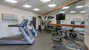 A gym with treadmills, weight machines, and free weights. - Best Western Canyon De Chelly Inn (Chinle)