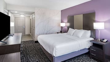 Premium bedding, pillow-top beds, desk, laptop workspace