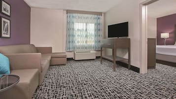 Premium bedding, pillow-top beds, desk, laptop workspace
