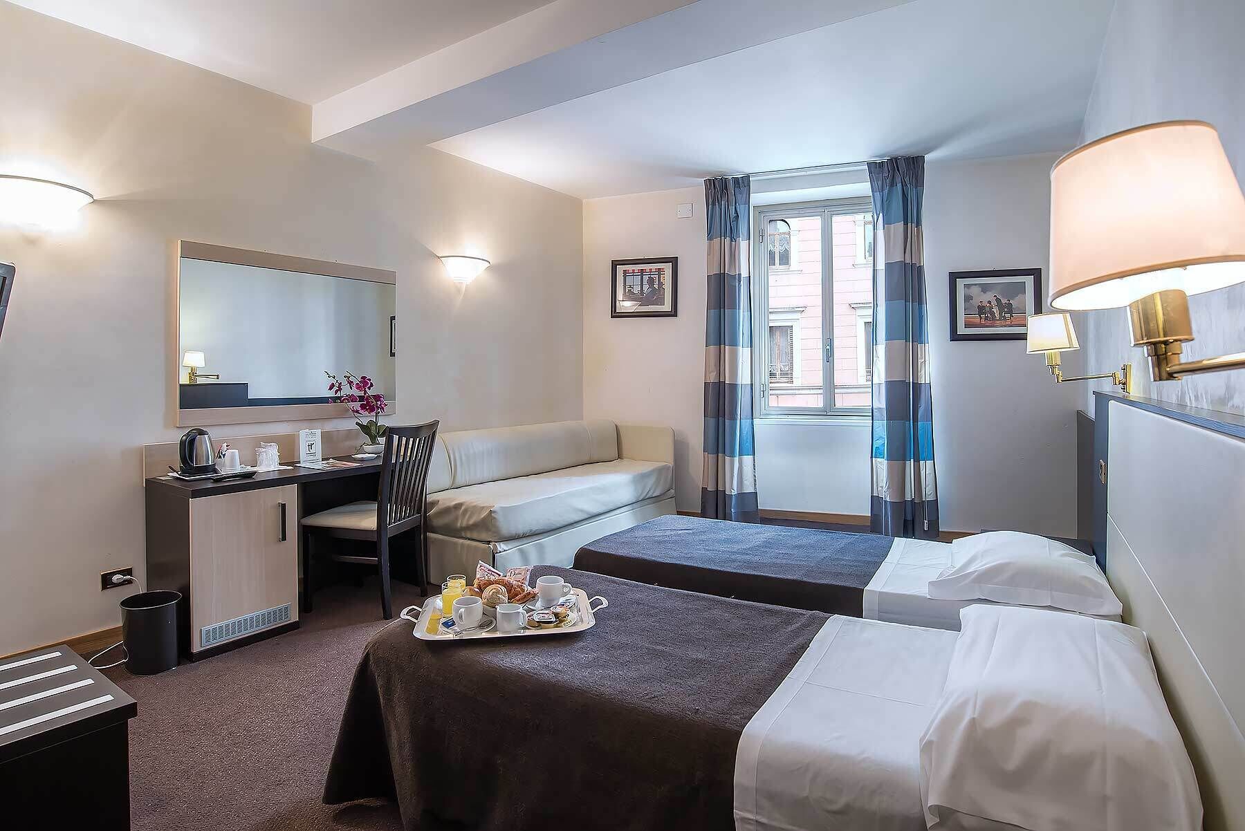 Luxe beddengoed, een kluis op de kamer, een bureau, geluiddichte muren