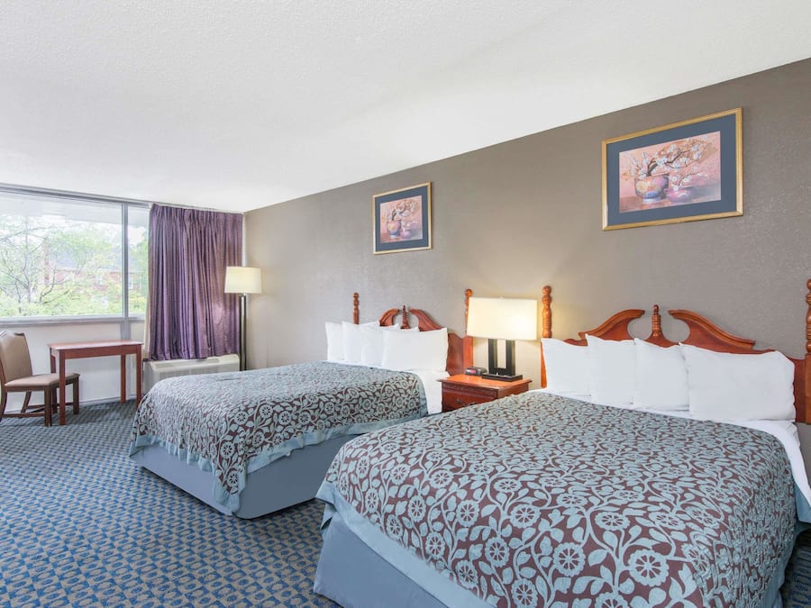 Desk, laptop workspace, blackout curtains, free cots/infant beds