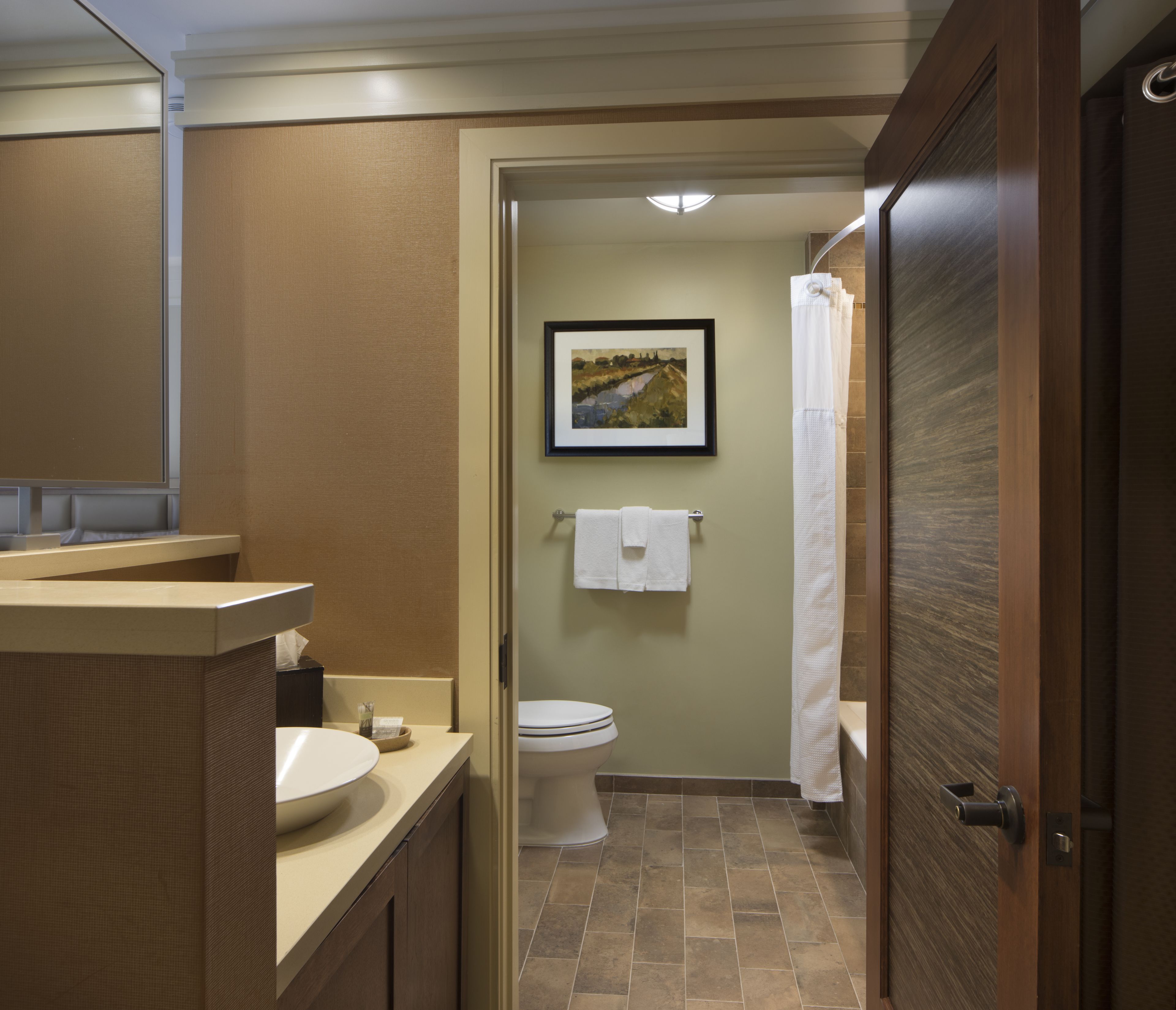 designer toiletries, hair dryer, dressing gowns, towels