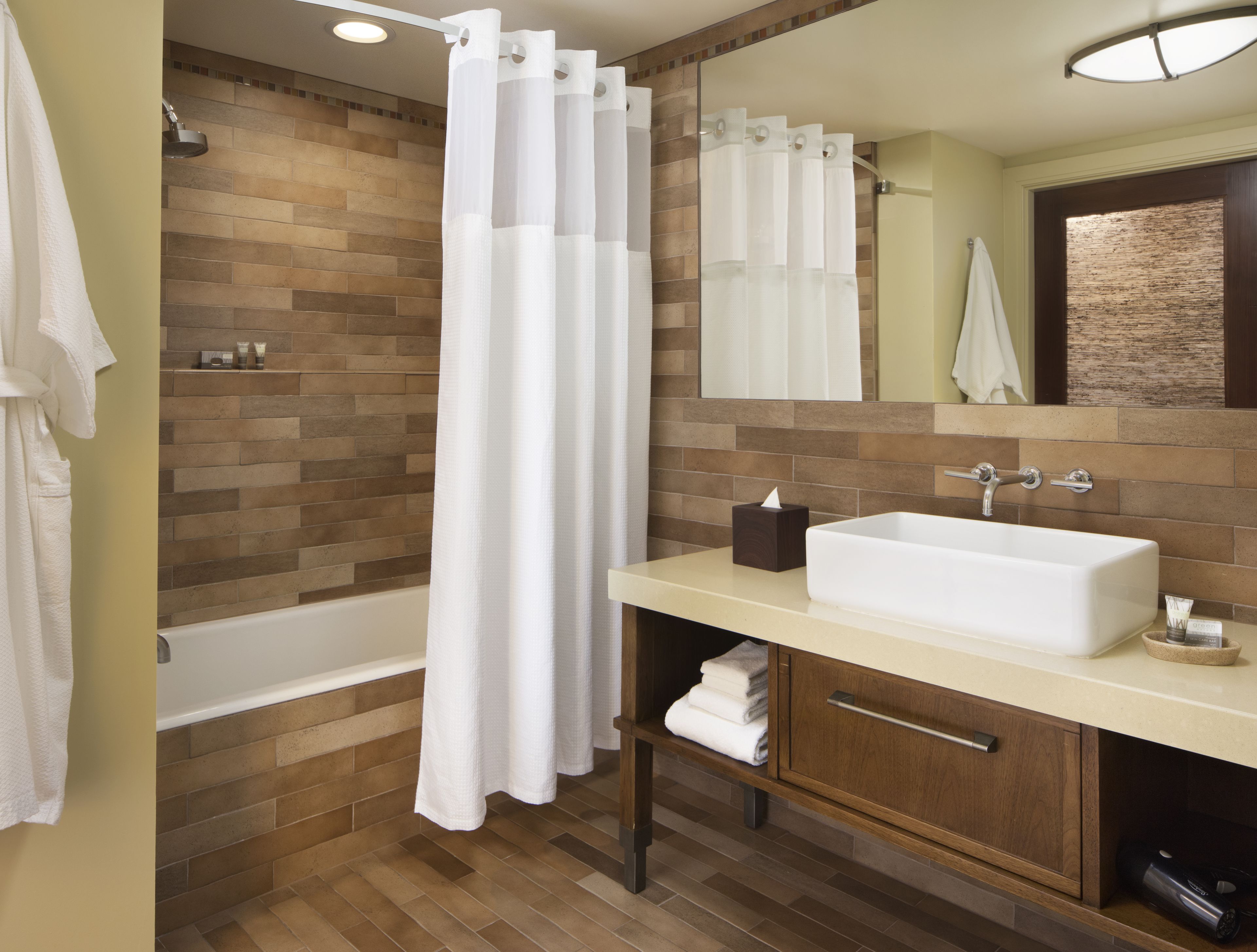 designer toiletries, hair dryer, dressing gowns, towels