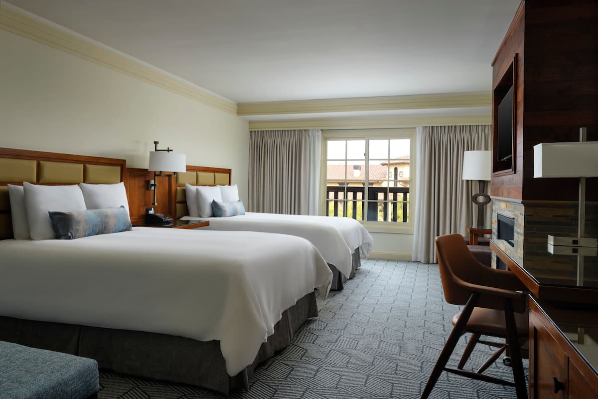 deluxe room, 2 queen beds, fireplace | premium bedding, in-room safe, individually decorated