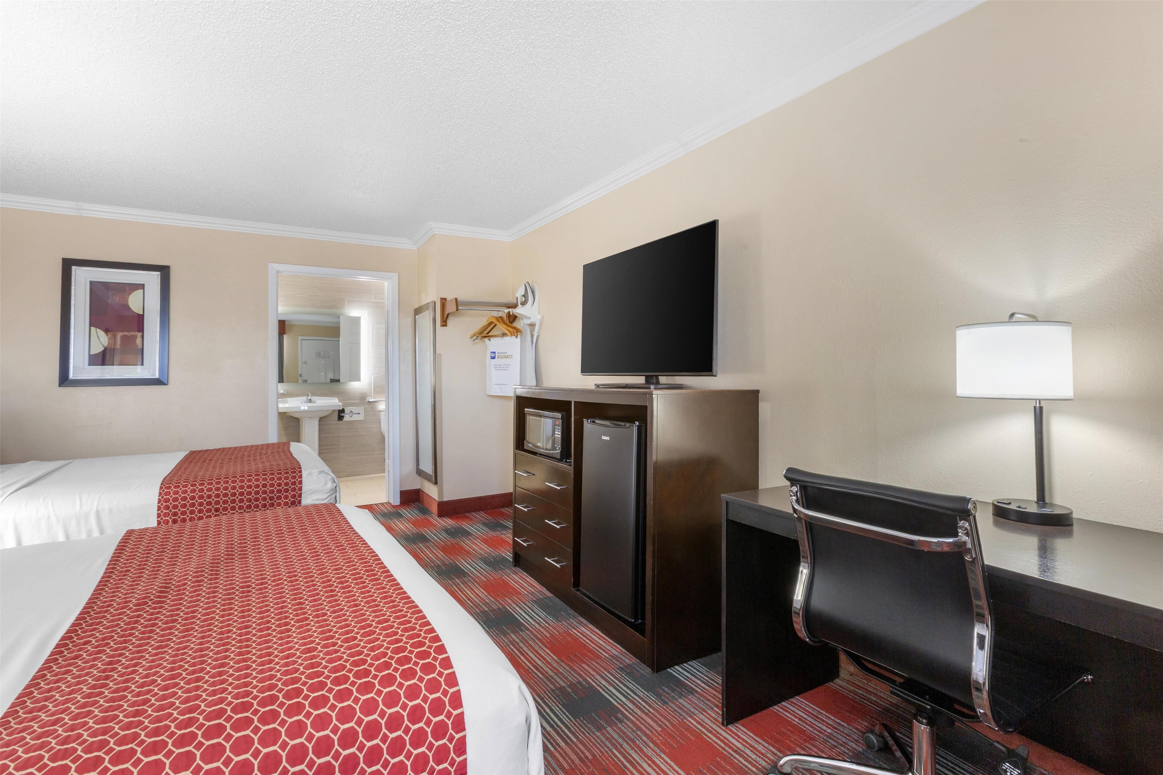 standard room, 2 queen beds, accessible, refrigerator & microwave | pillow-top beds, desk, laptop workspace, iron/ironing board