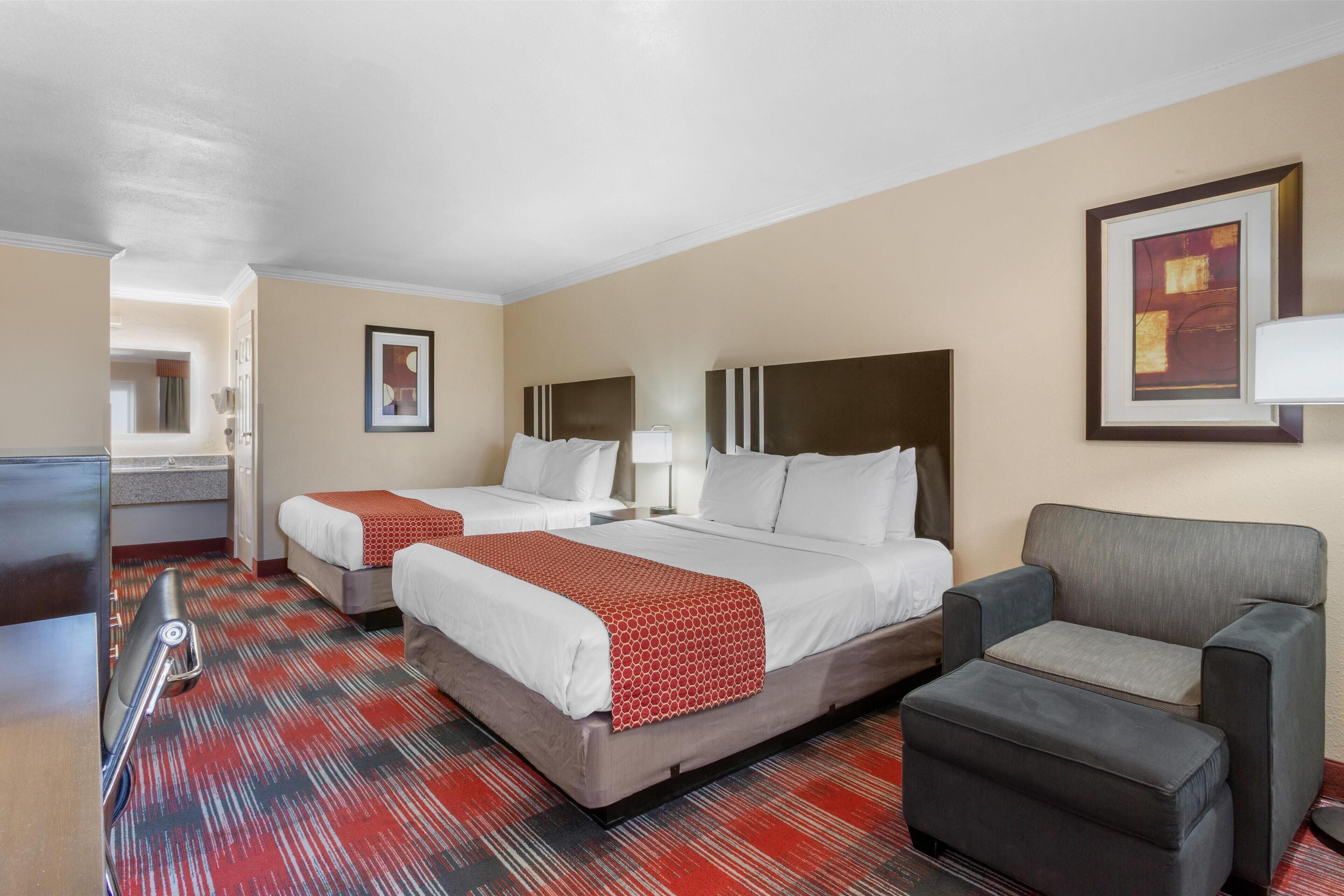 standard room, 2 queen beds, non smoking, refrigerator & microwave (walk-in shower) | pillow-top beds, desk, laptop workspace, iron/ironing board