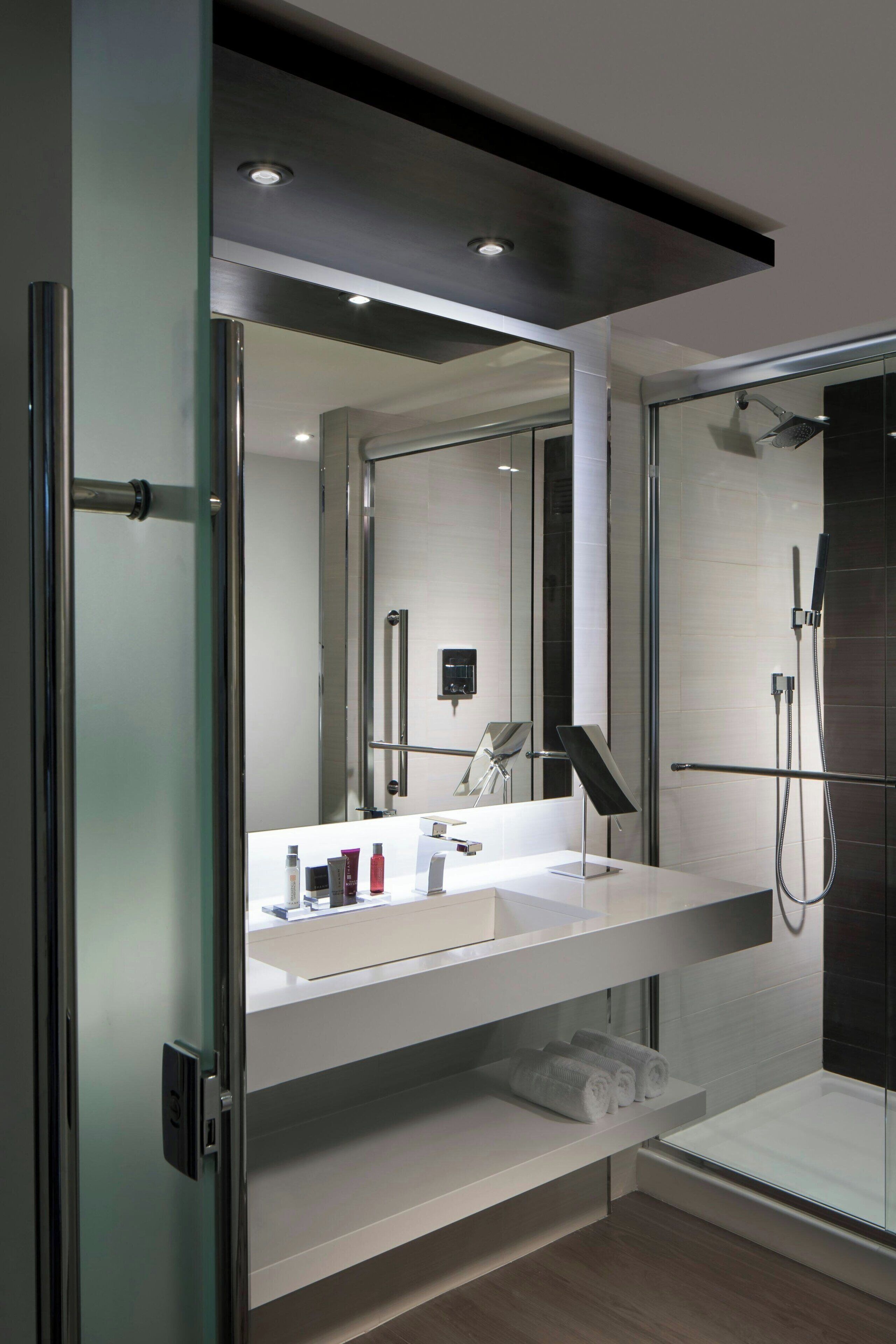 shower, free toiletries, hair dryer, towels