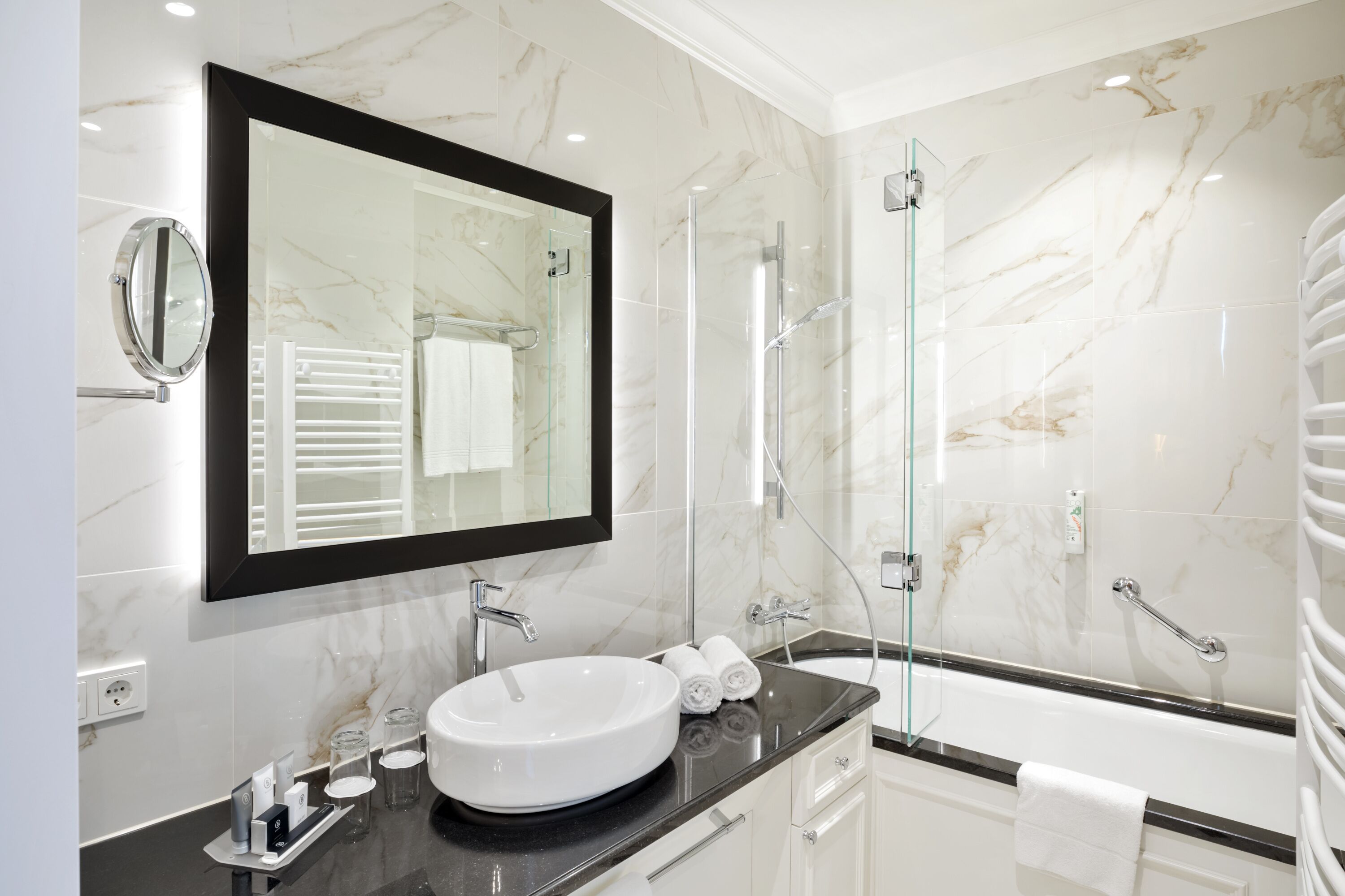 suite | bathroom | hair dryer, towels, shampoo