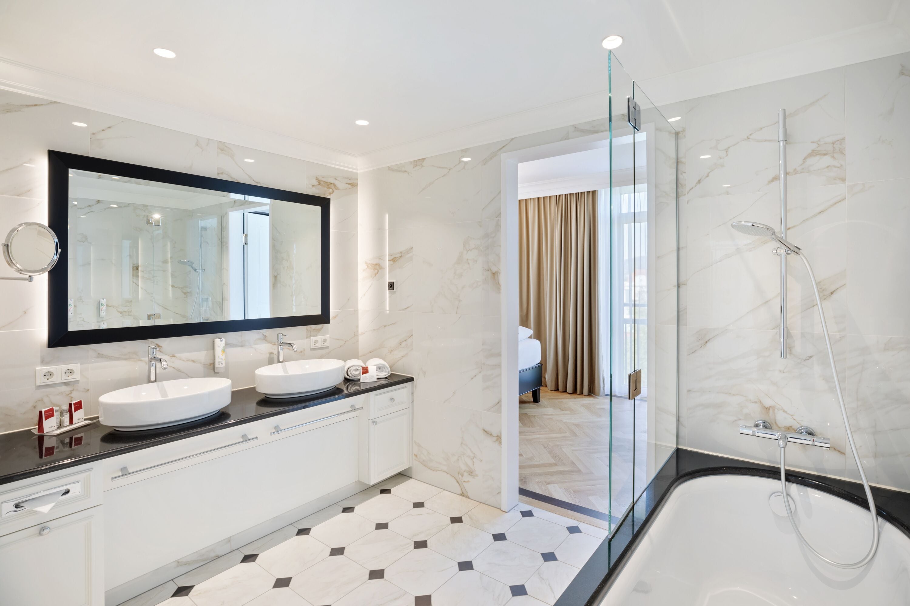 suite | bathroom | hair dryer, towels, shampoo