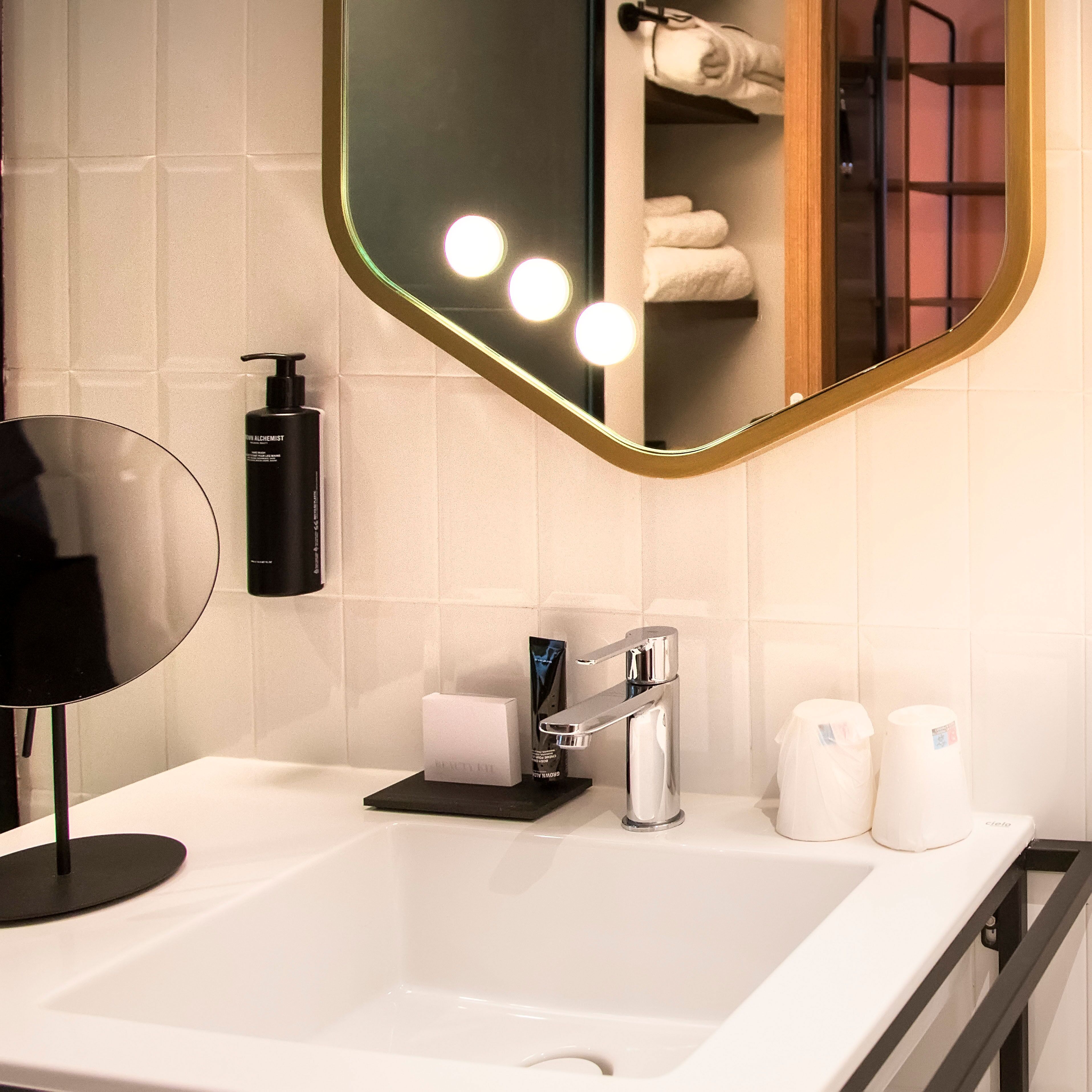 eco-friendly toiletries, hair dryer, slippers, bidet