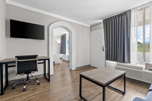 Suite, 1 King Bed, Non Smoking | Premium bedding, individually decorated, desk, blackout drapes