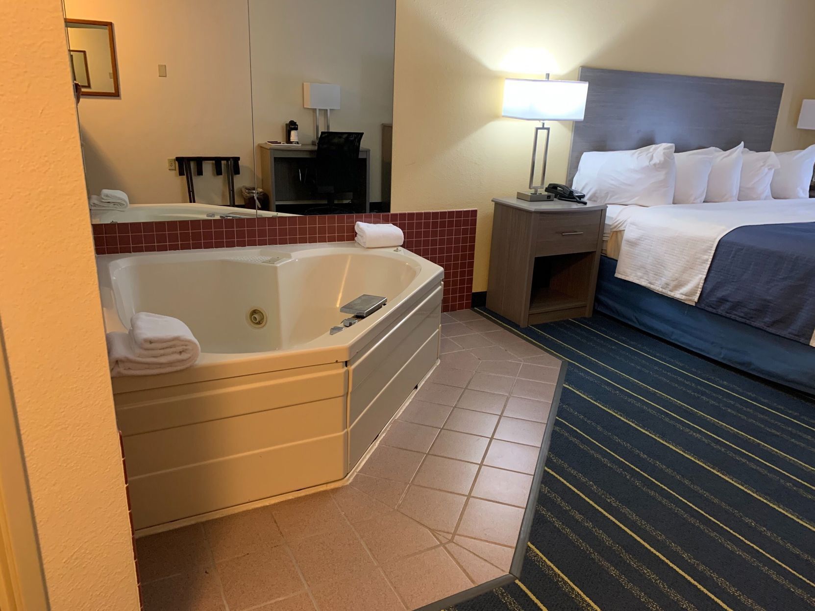Premium bedding, desk, laptop workspace, free WiFi