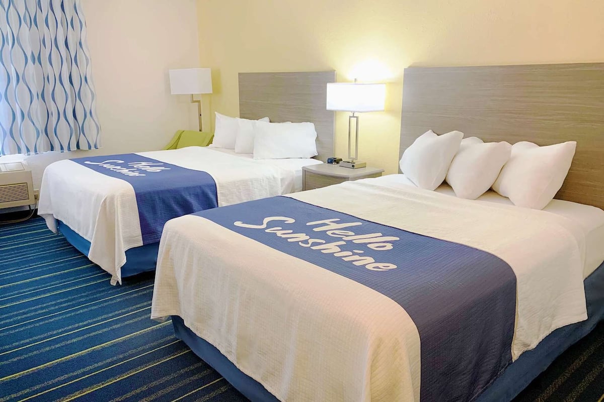 Premium bedding, desk, laptop workspace, free WiFi