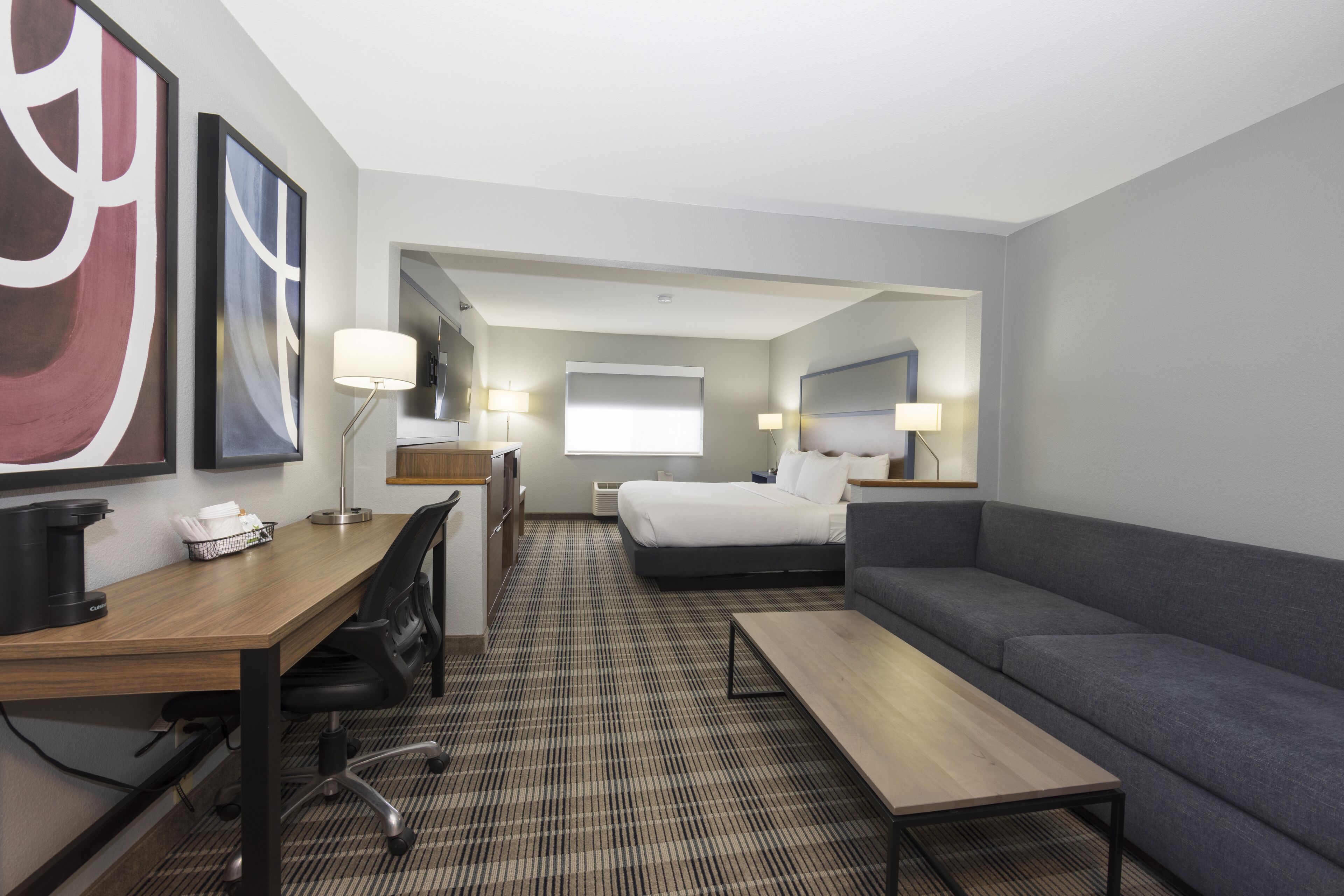 suite, 1 king bed, non smoking | desk, laptop workspace, blackout curtains, iron/ironing board