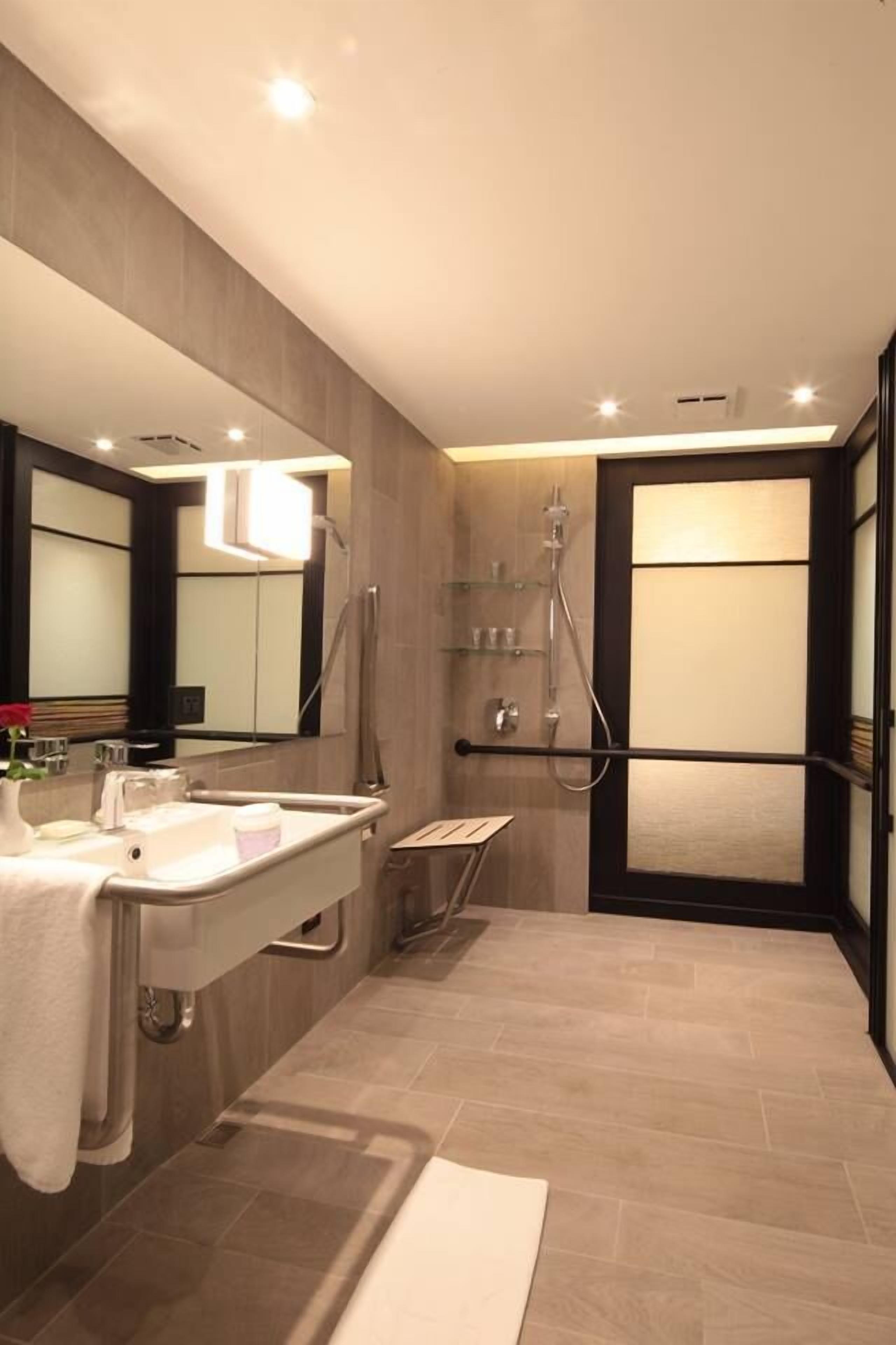 accessible room | bathroom | hair dryer, bathrobes, slippers, bidet