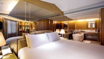 Premium bedding, down comforters, minibar, in-room safe
