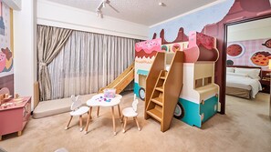 Family Suite Room | 1 bedroom, down comforters, minibar, in-room safe