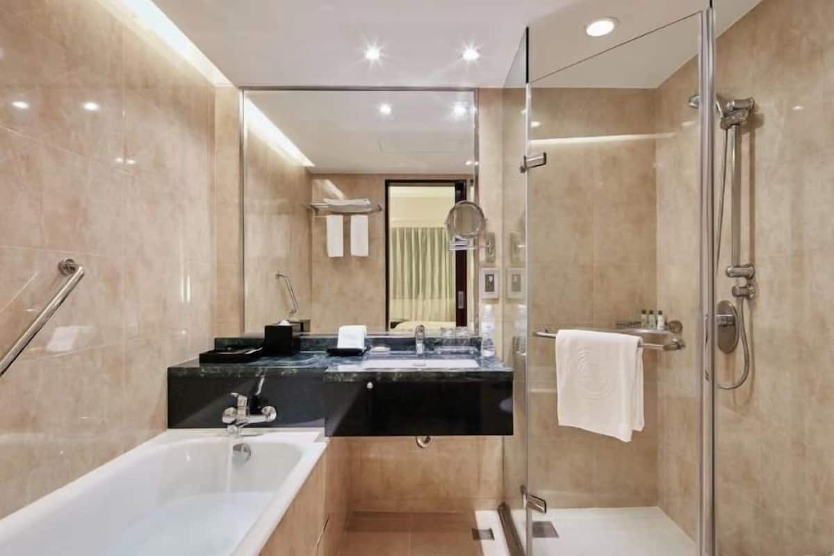 Bathroom | Separate bathtub and shower, deep-soaking bathtub, free toiletries