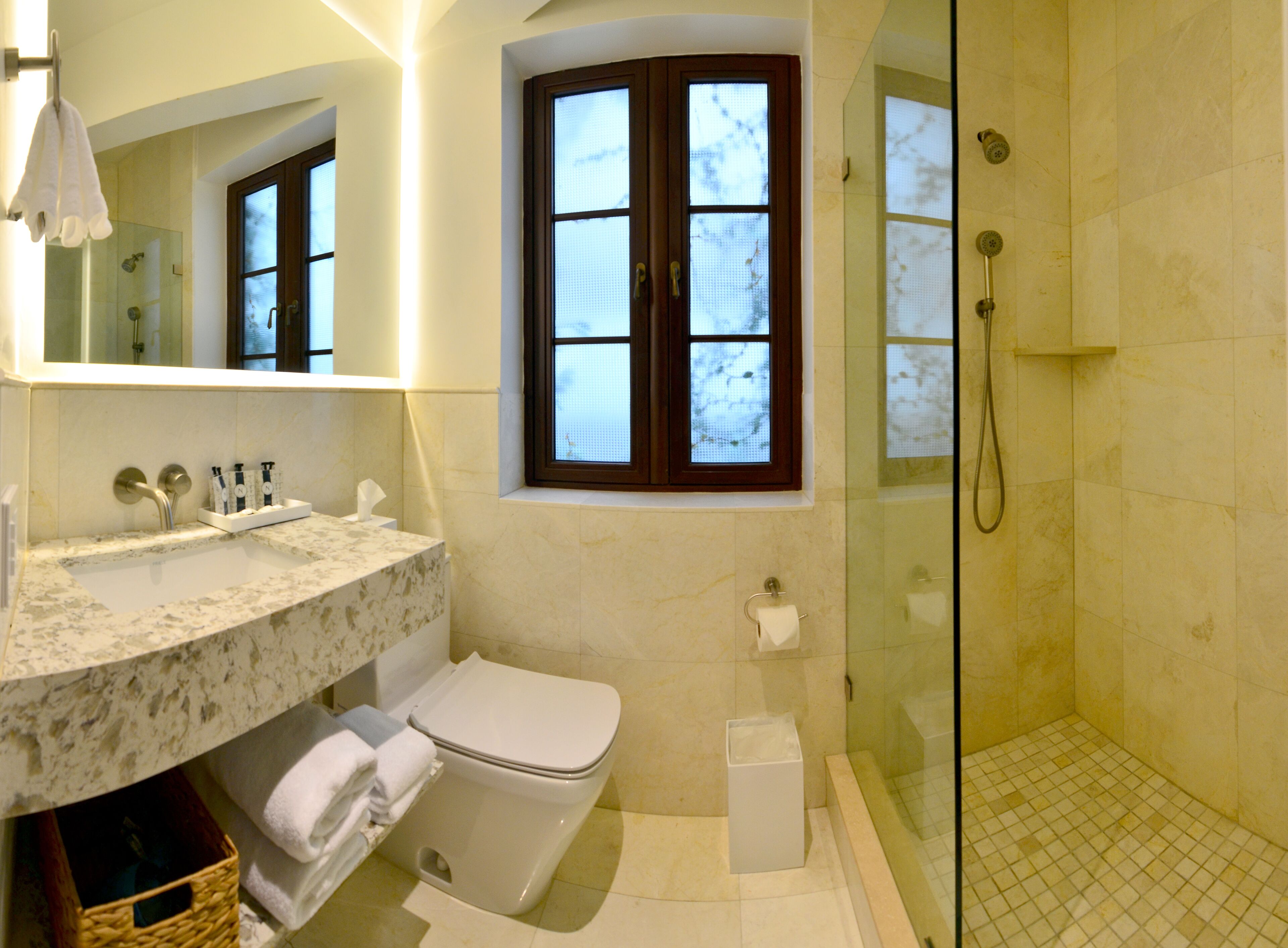 superior suite, 1 king bed (king suite) | bathroom | rainfall showerhead, designer toiletries, hair dryer, towels