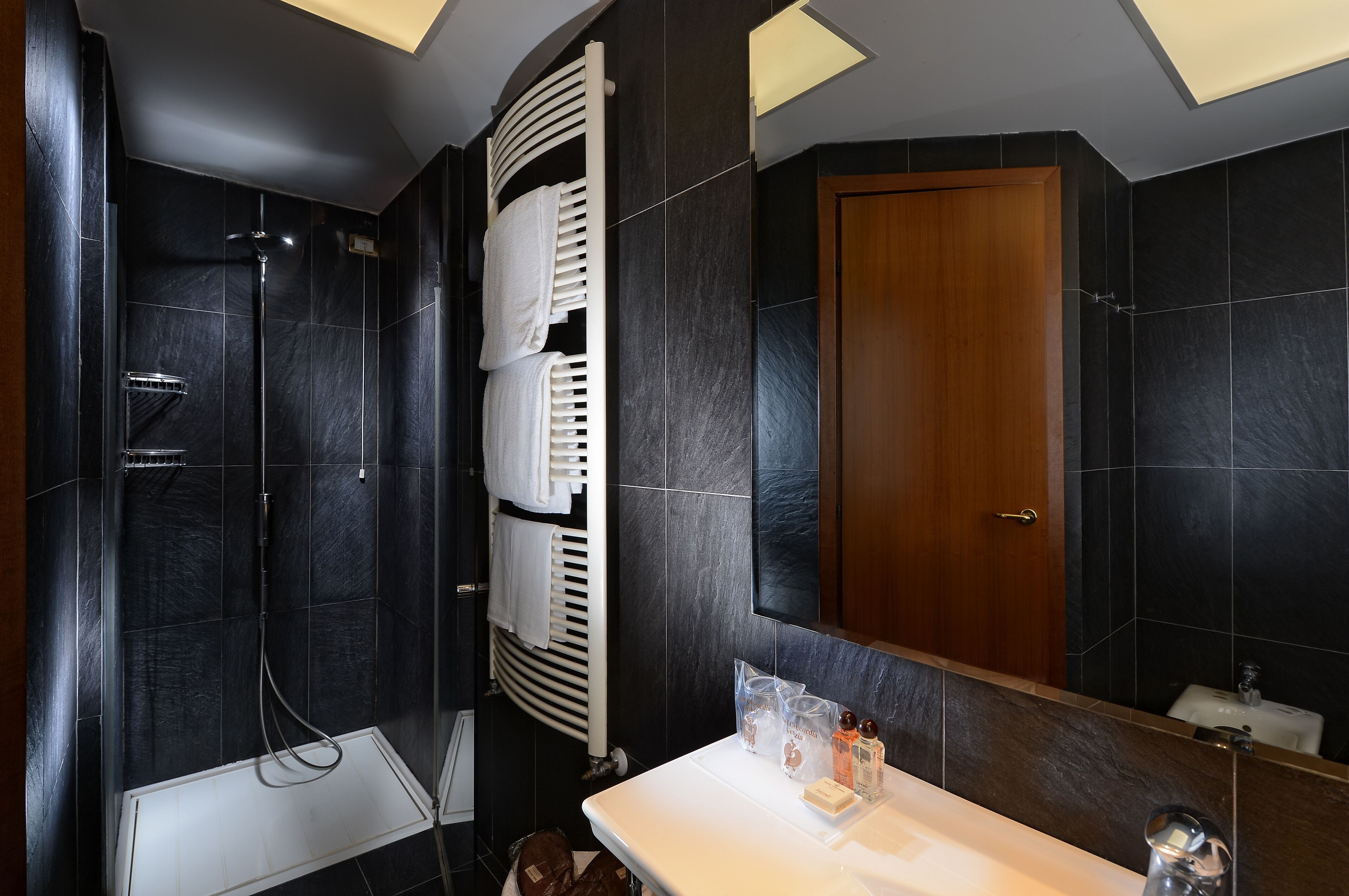 junior suite (saint mark view) | bathroom | rainfall showerhead, free toiletries, hair dryer, slippers