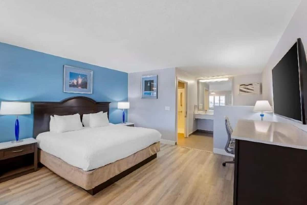 Pillow-top beds, desk, laptop workspace, blackout curtains