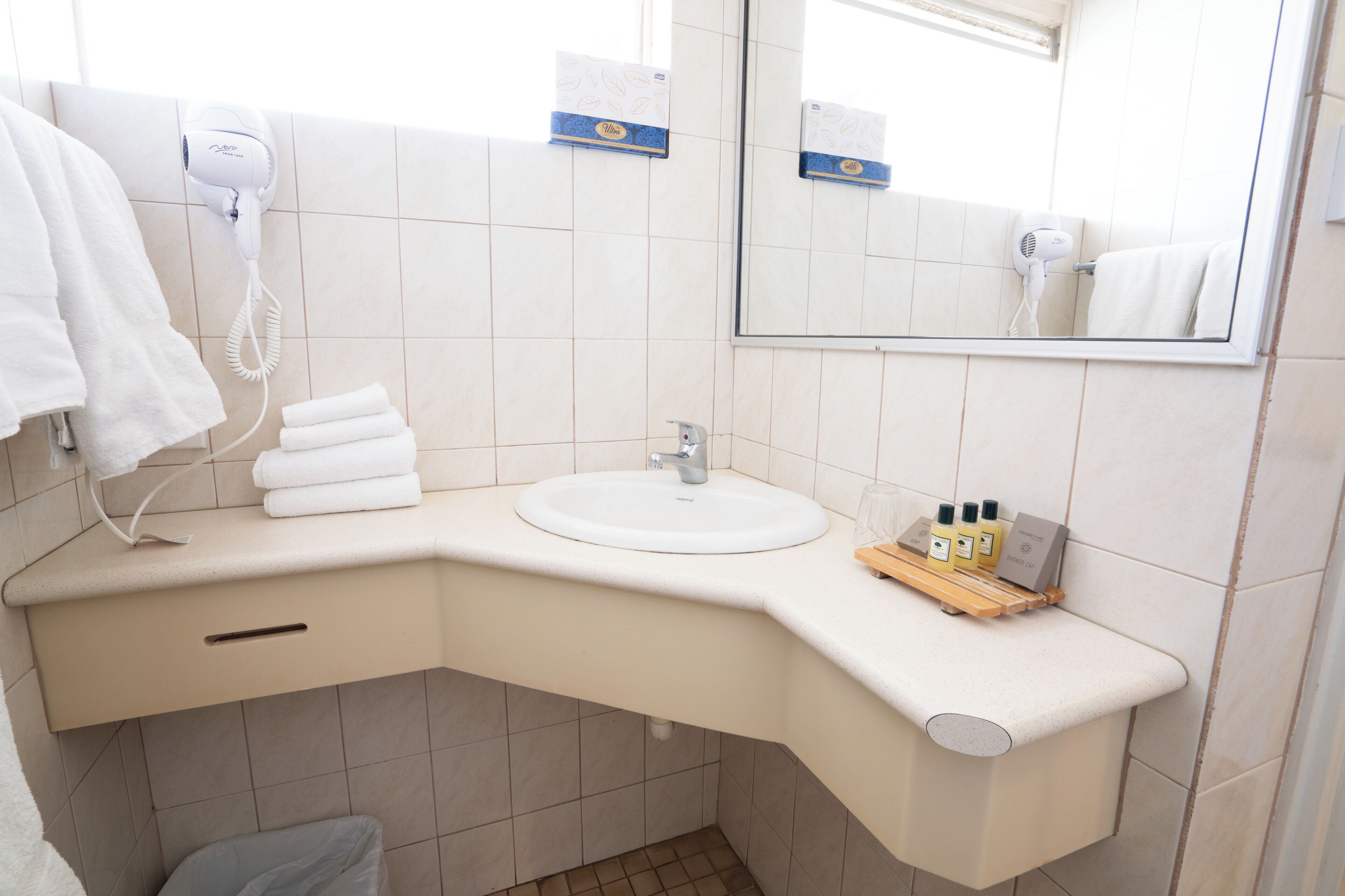 standard room (queen) | bathroom | free toiletries, hair dryer, towels